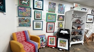 Interior of Moon Over Water art gallery in Rockport, Texas featuring Robbin's work