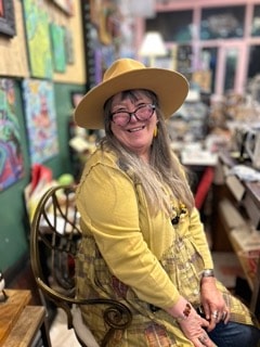 Janie, owner of Visions on Main Street gallery in Eureka Springs, Arkansas