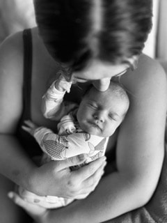 Black and white mother and newborn