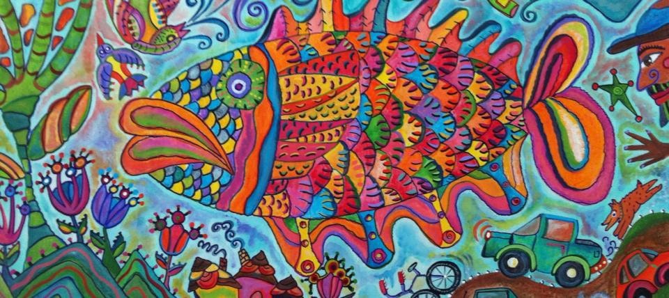Large vibrant folk art fish with birds and whimsical scene