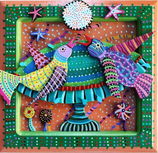 Two colorful birds on pedestal in green dotted frame